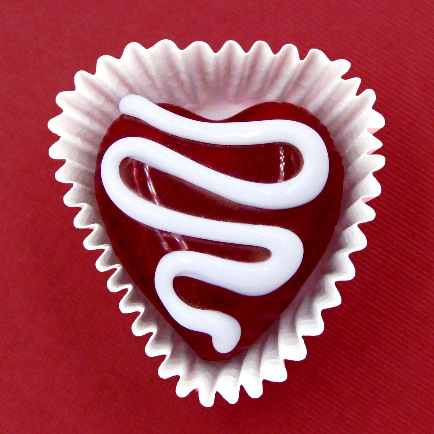 Heart-Shaped Chocolate Treats with Drizzles of Creamy Frosting - Assorted Colors (14-059+)