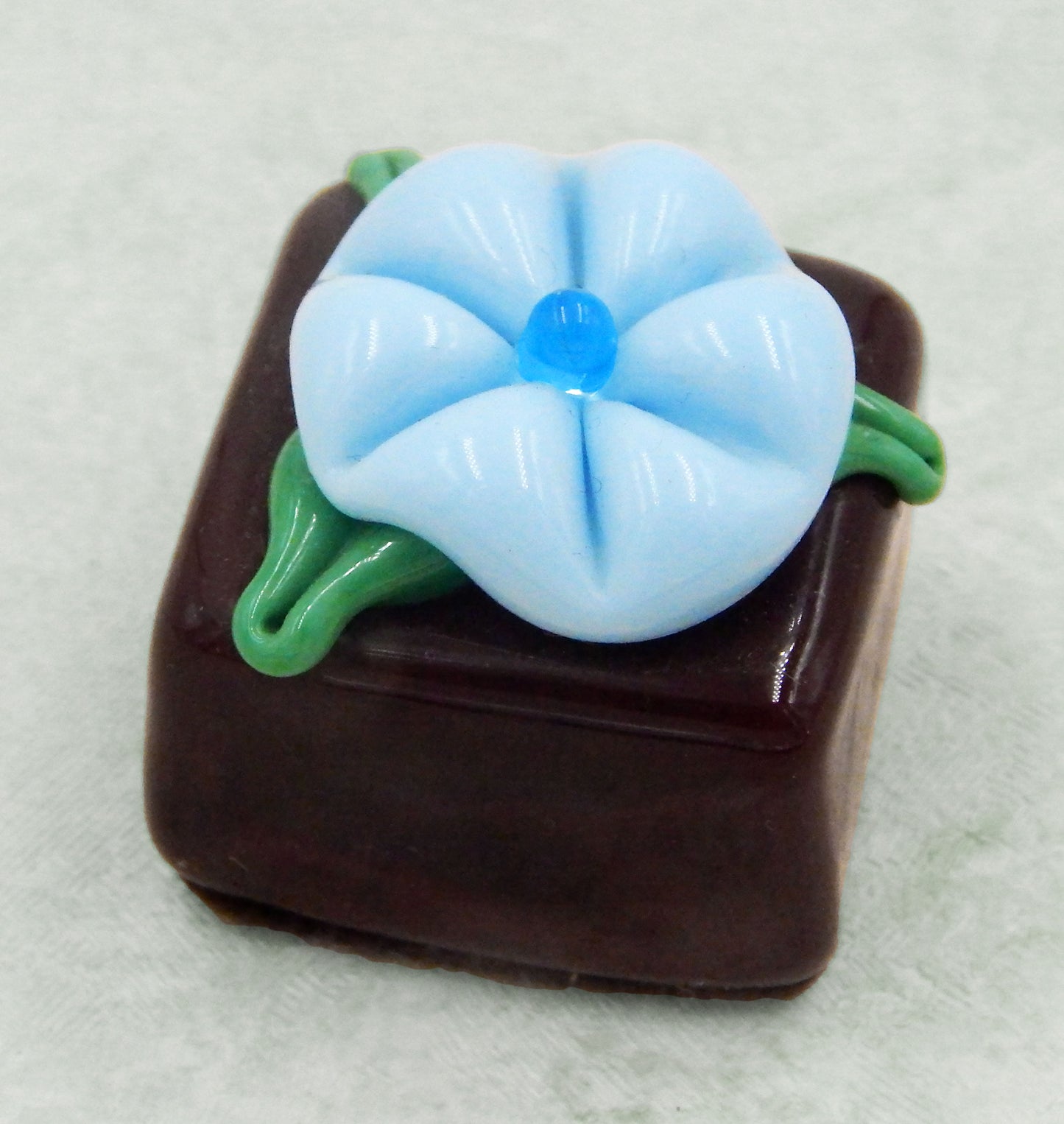 Chocolate Cube with Berry Blue Flower (15-024CBB)