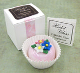 Three Flower Nosegay atop a Pink/White Petit Four Chocolate (81-123S)